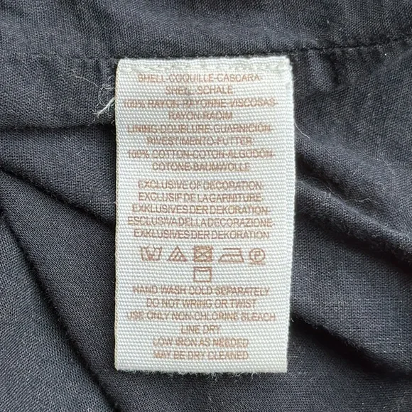 Free People Black mini dress with white embroidered rosette’s open back size M - Picture 14 of 14